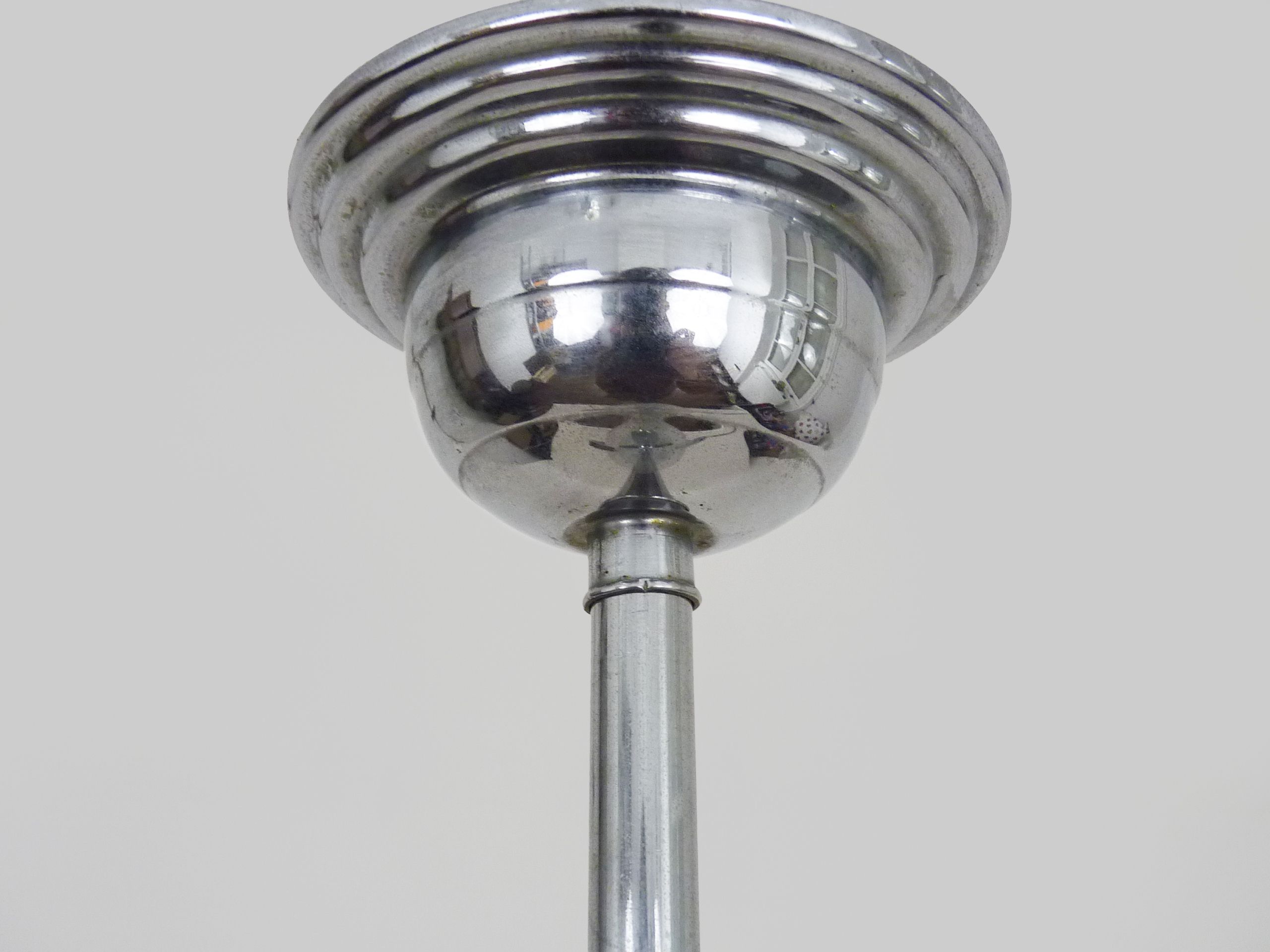 Suspension in chromed metal and glass, space age, arrow crossing a globe. Seventies