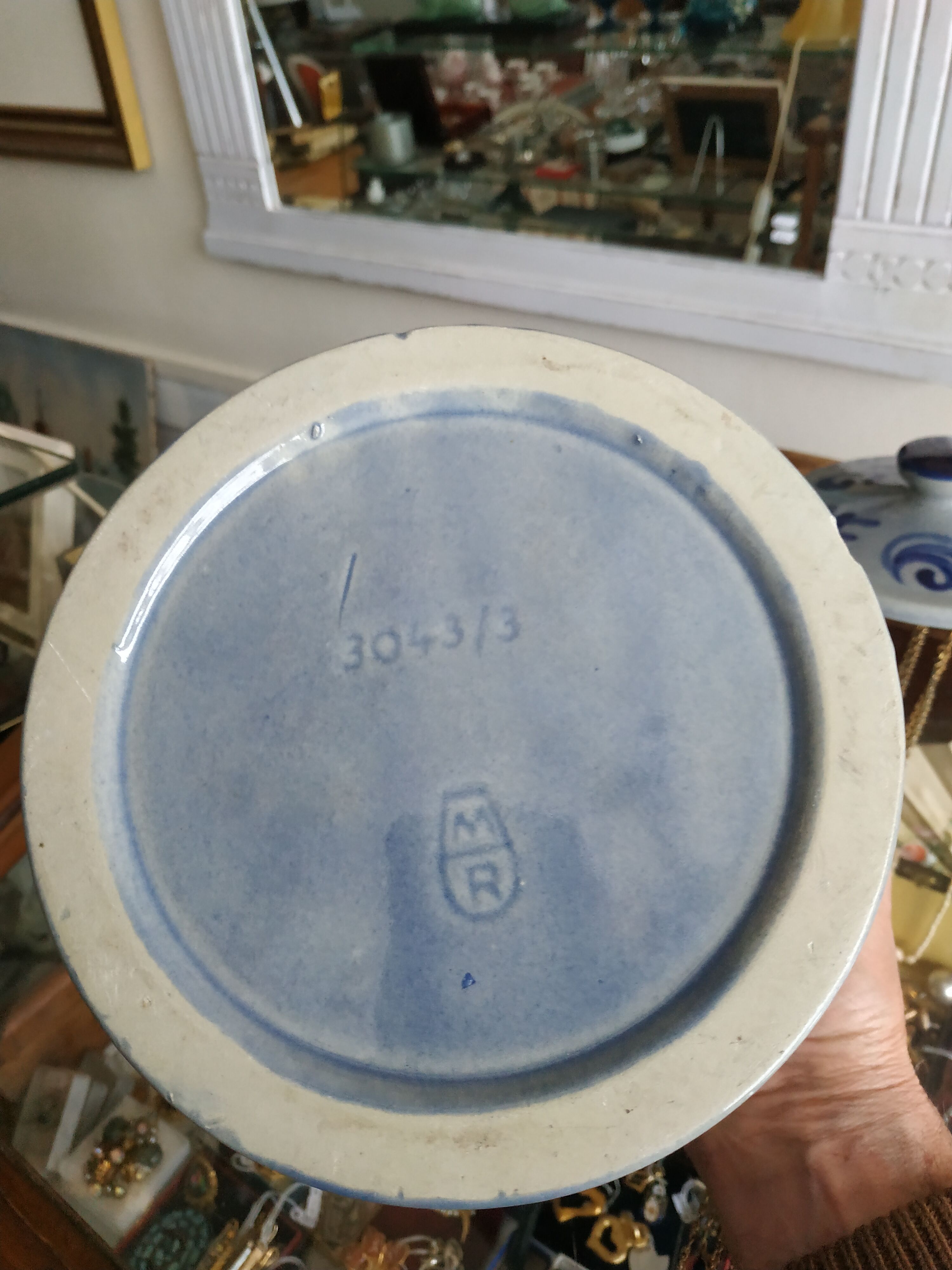 Covered sandstone pot