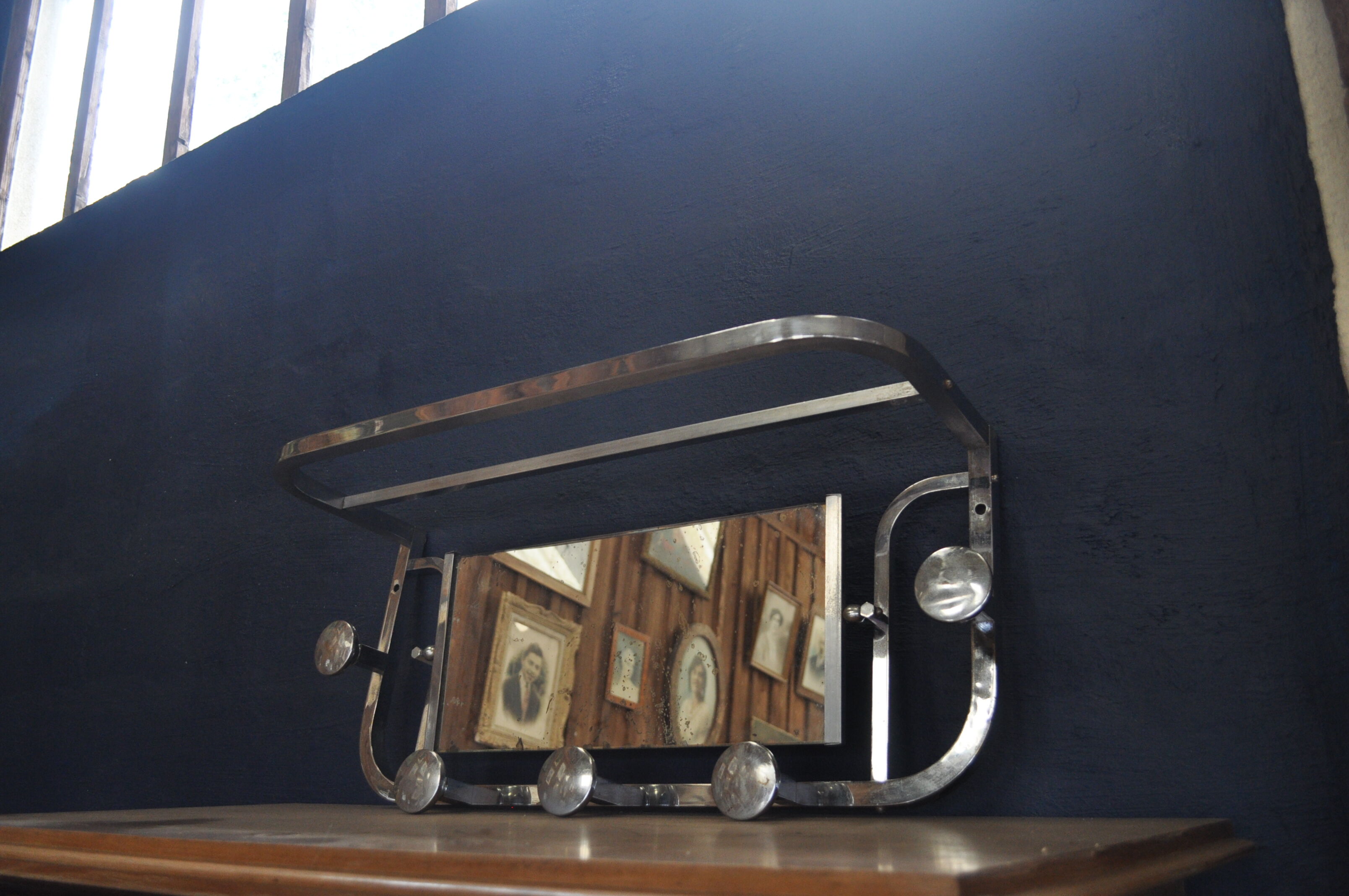 Aluminum wall coat rack.