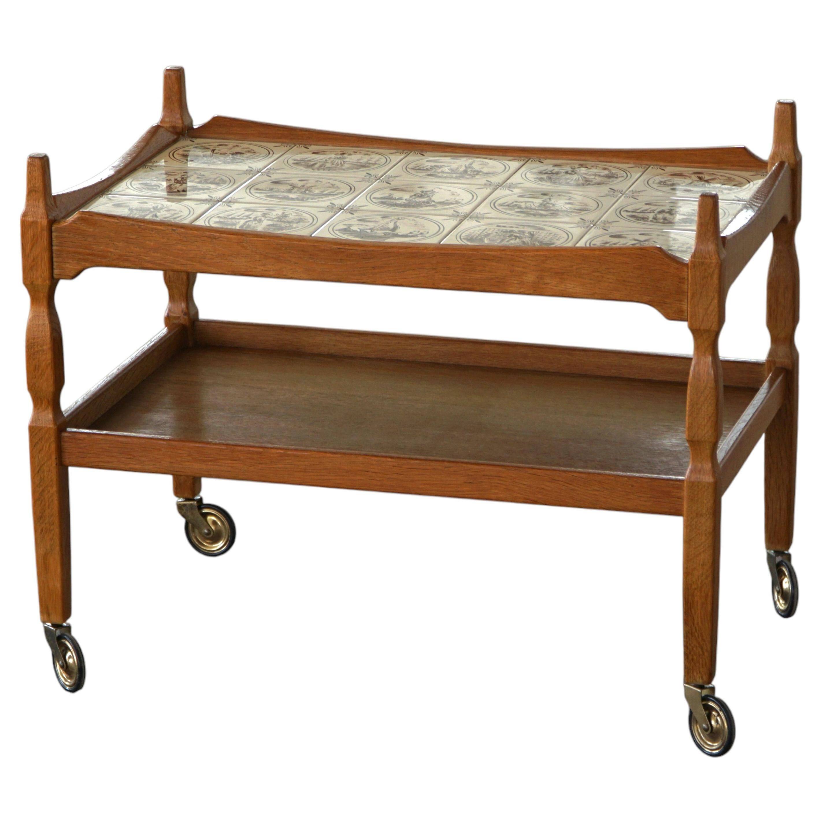 Modern Danish service trolley with tiled top, Henning Kjærnulf, Denmark, 1960s.