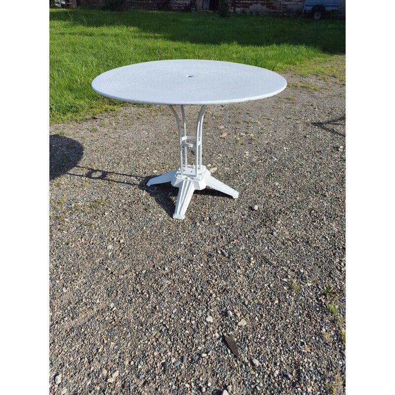 Garden table with a cast iron top.