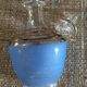 Antique carafe in blue granite glass and gilded edging