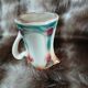 Antique slipware milk jug