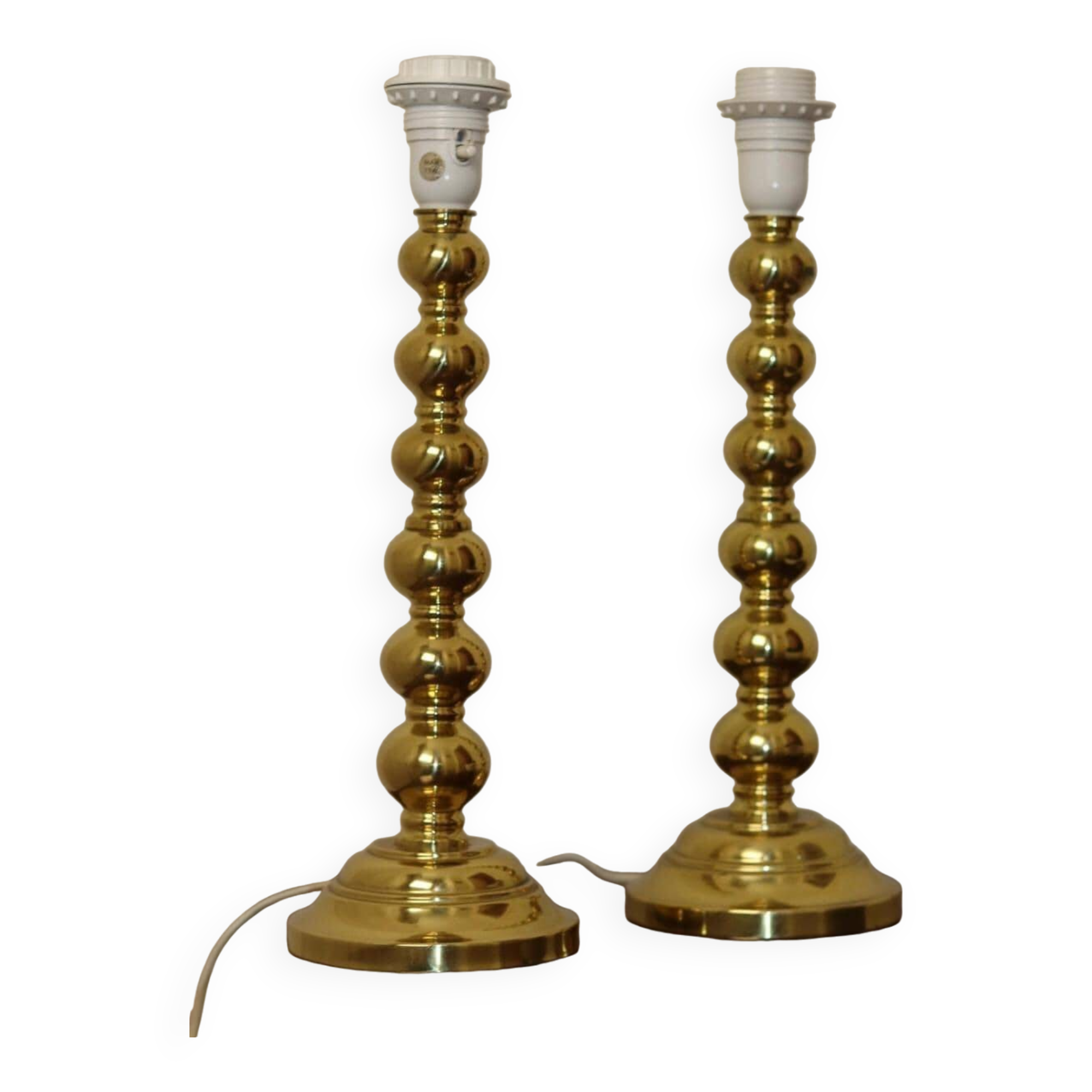 Pair of Swedish brass lamps from the mid-century.