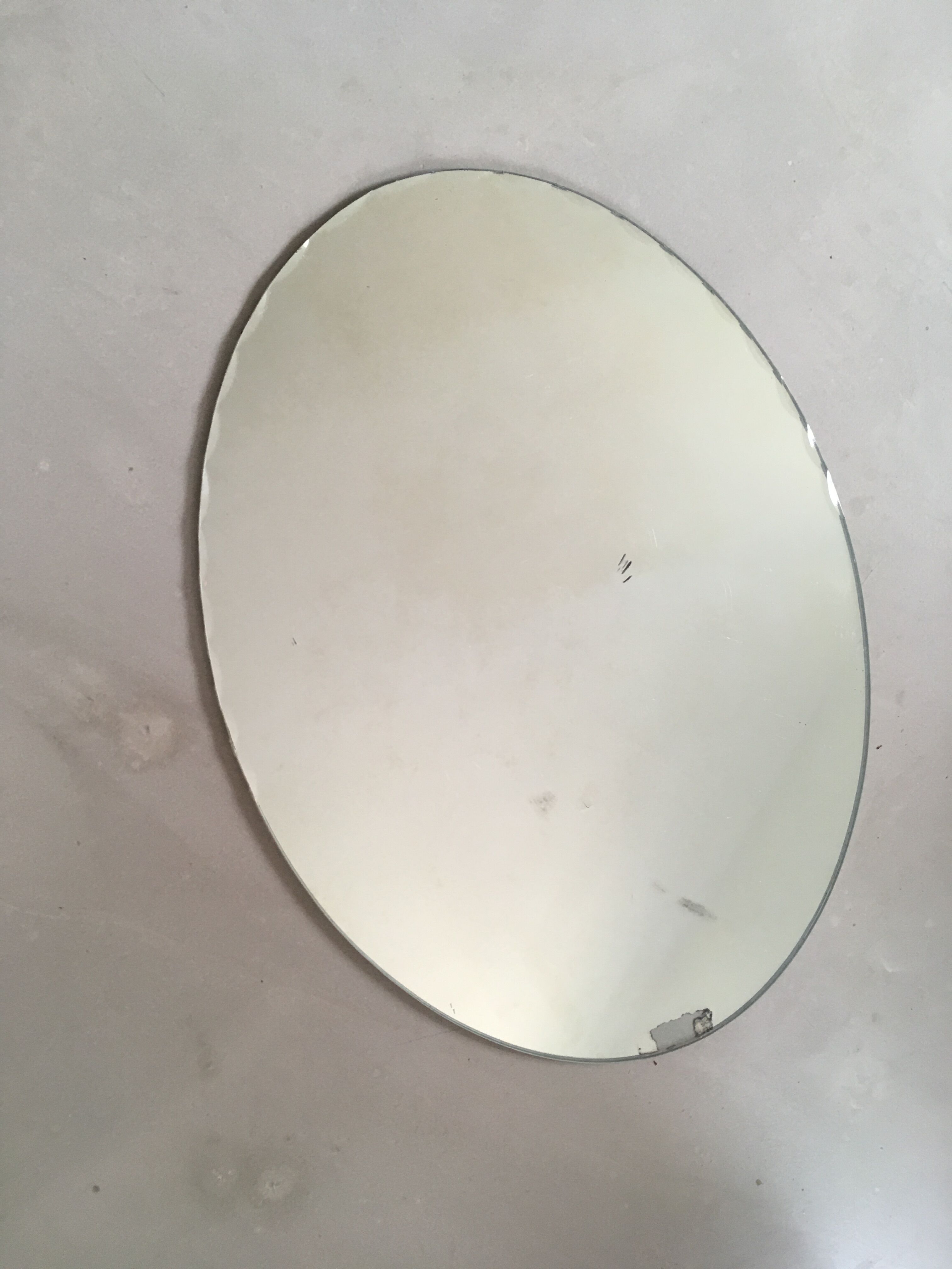 Ancient chiseled oval mirror 44x60cm