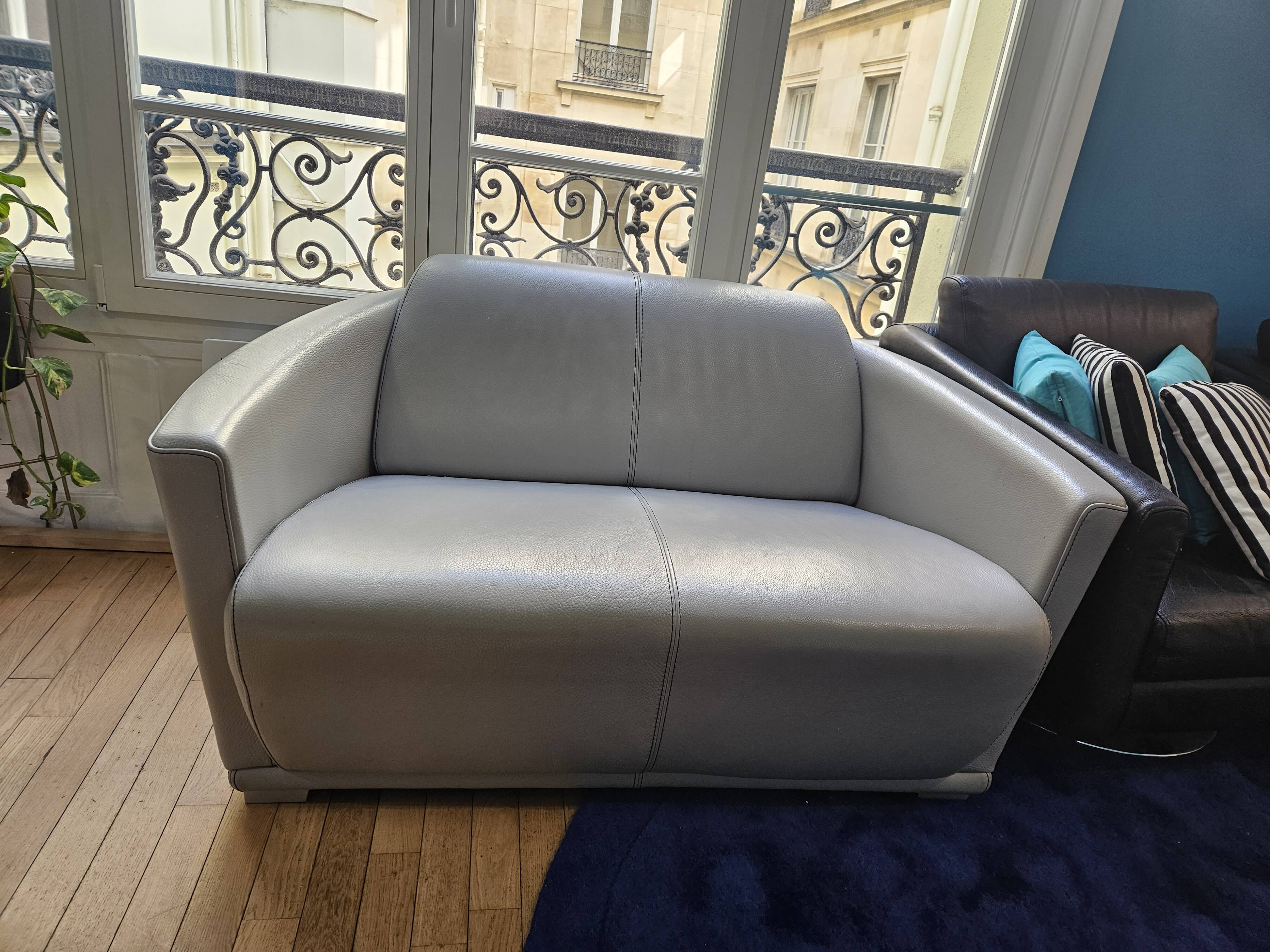 3-seater sofa, 2-seater sofa and an armchair in grey leather by Calia Italia.