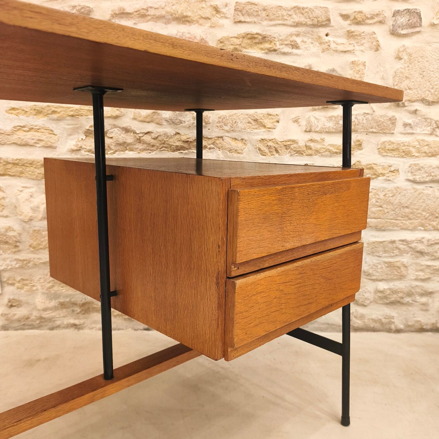 Modernist desk with suspended drawer unit, French work from the 1950s.