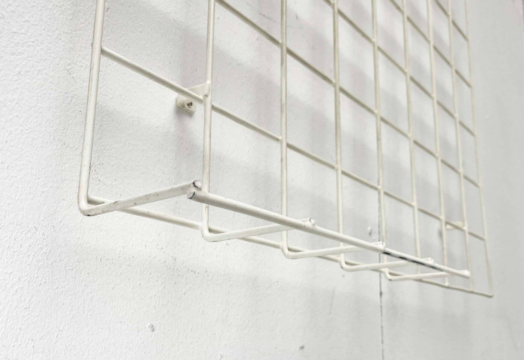 Minimalist white wire coat rack from mid-century Germany, 1960s.