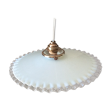 Old suspension in toothed opaline