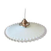 Old suspension in toothed opaline