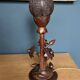 Art Deco wooden lamp with hand-carved lotus flower.