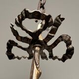 Empire-style bronze chandelier with 3 arms of light topped with eagle heads. French work. Circa 1900.