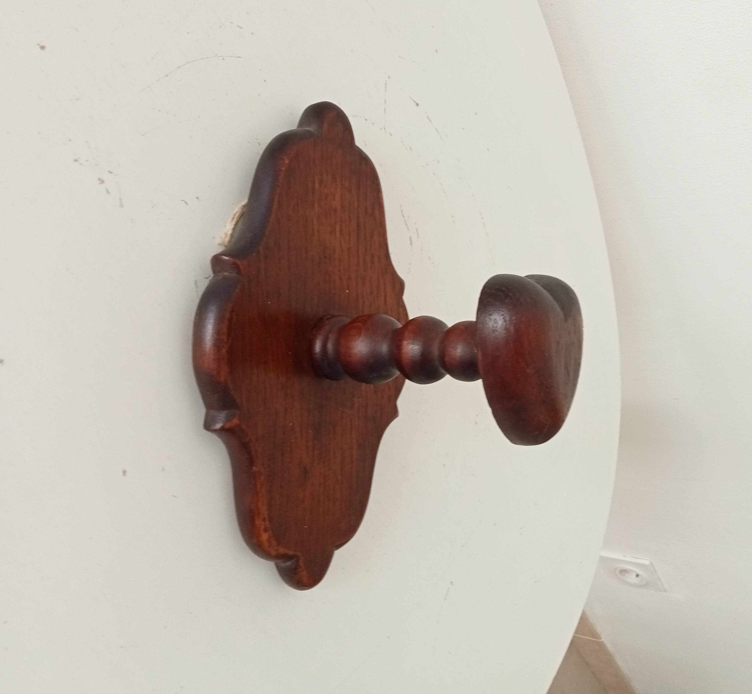 Vintage wall coat rack in carved solid wood, popular art.