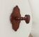 Vintage wall coat rack in carved solid wood, popular art.