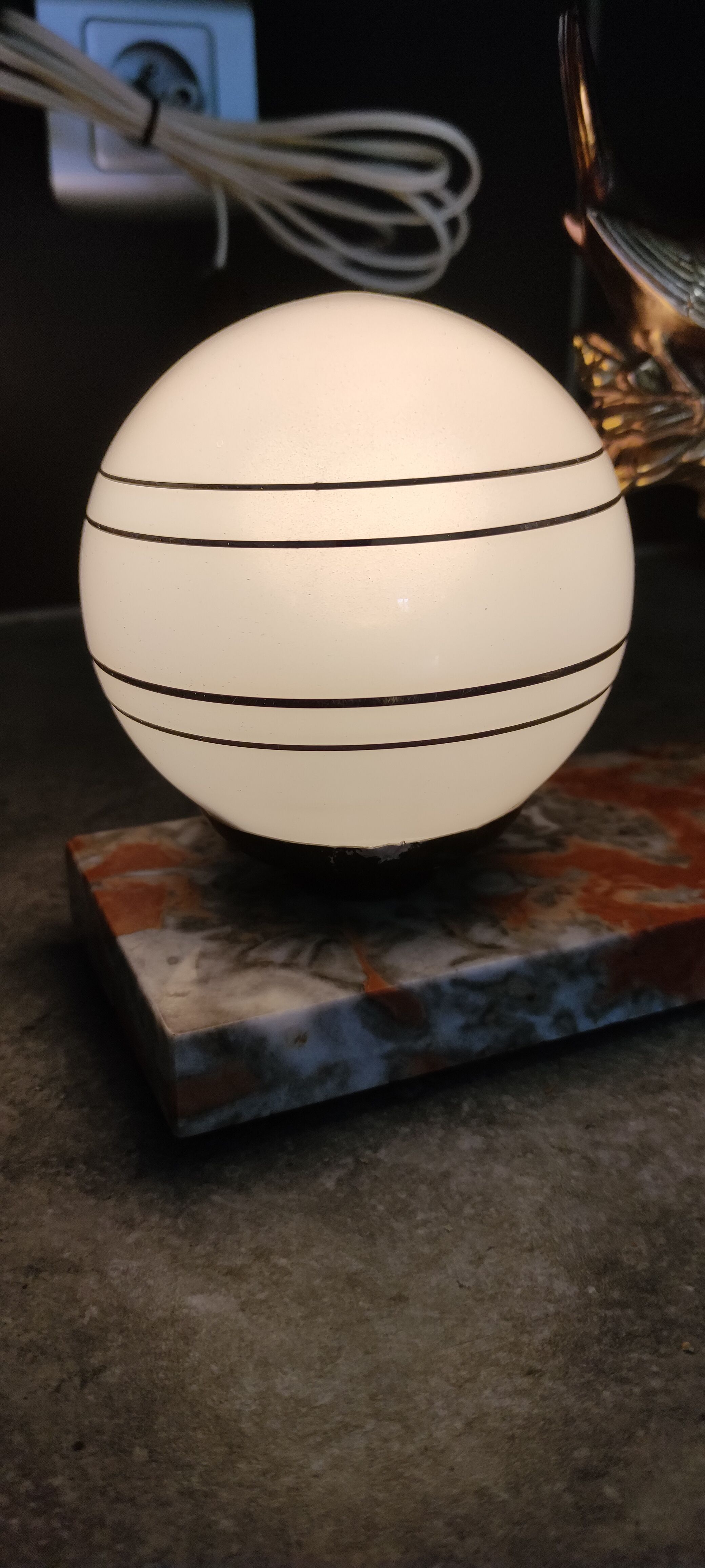 Globe and marble art deco lamp