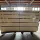 Chest of drawers signed Jean Claude Mahey in ivory lacquer and brass – 1920s