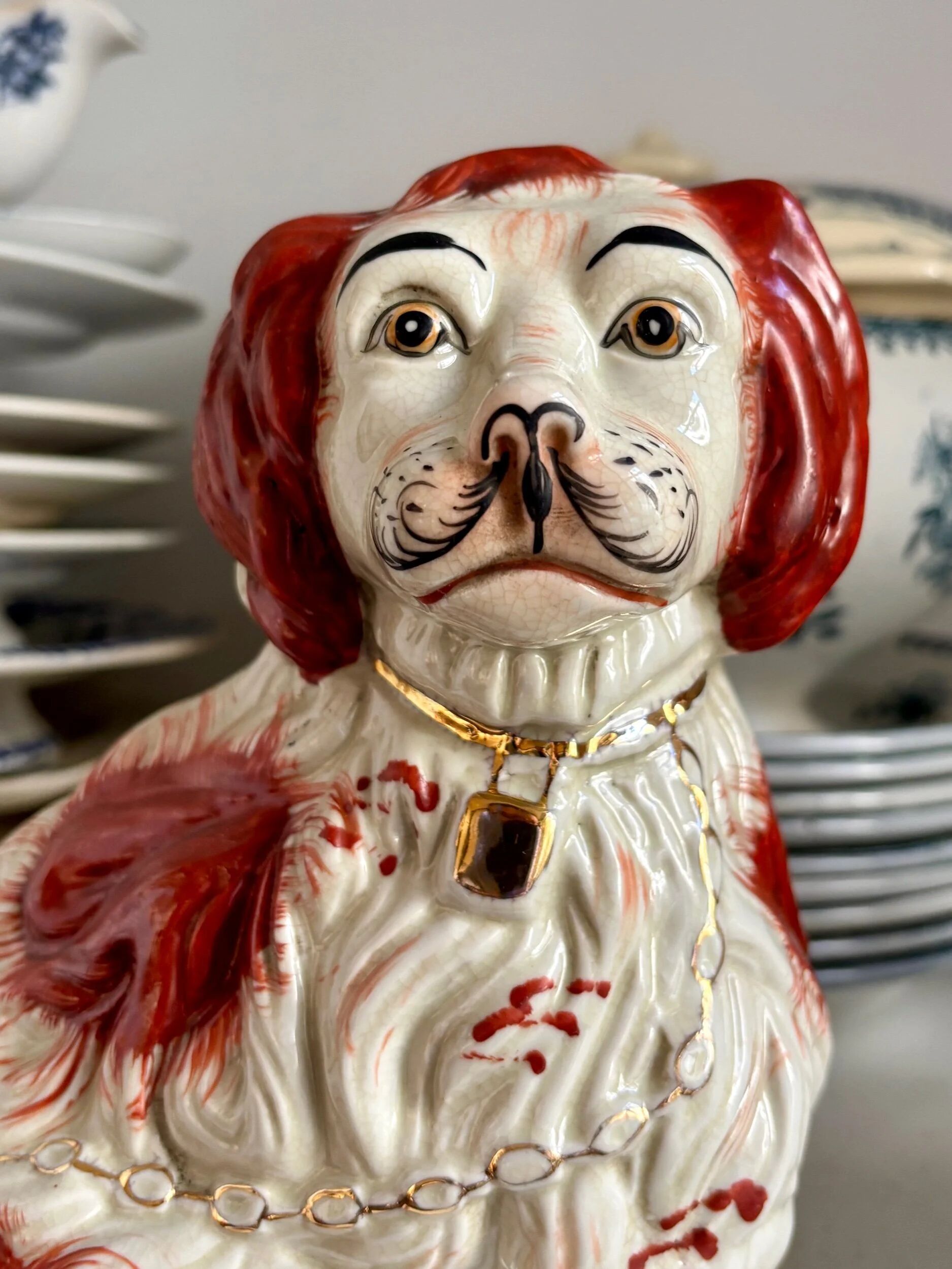 Pair of red Cavalier King Charles dogs in Staffordshire pottery, 19th century.
