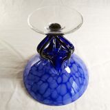 Blue glass cup on foot