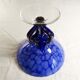 Blue glass cup on foot