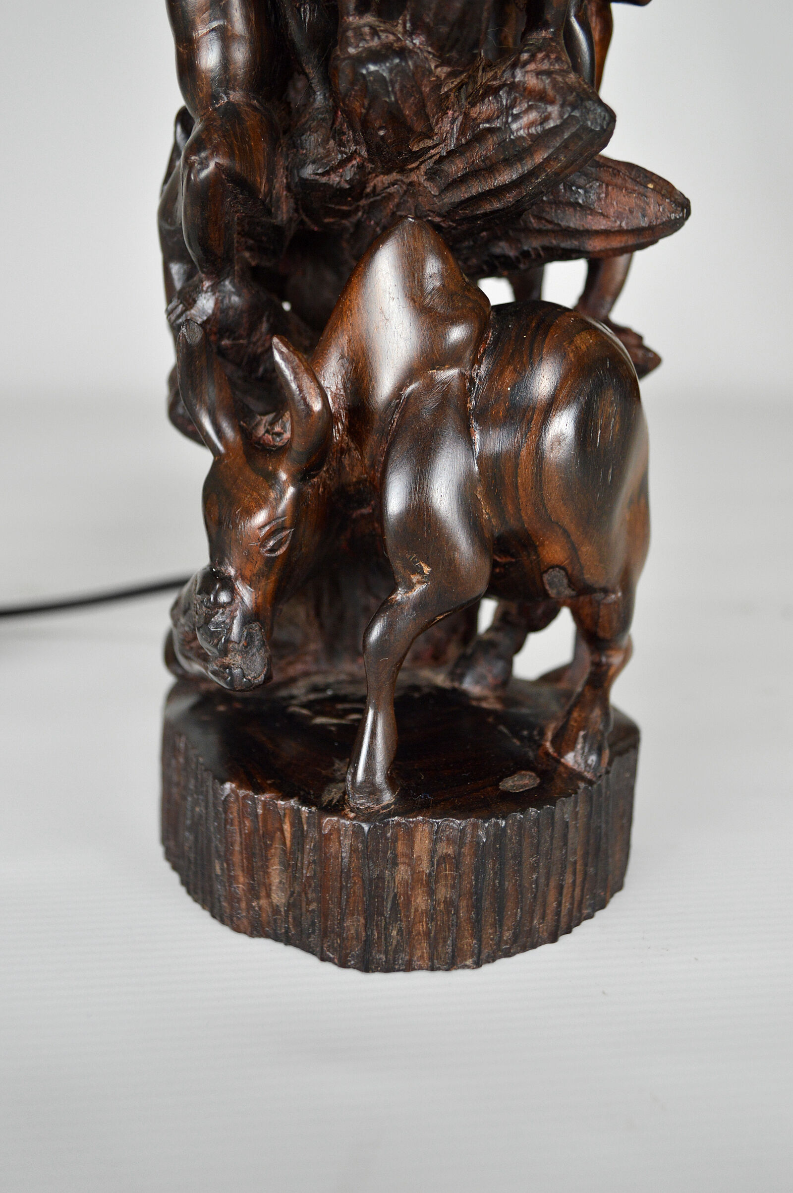 African carved ebony lamp, "Hunters, buffalo and crocodile"