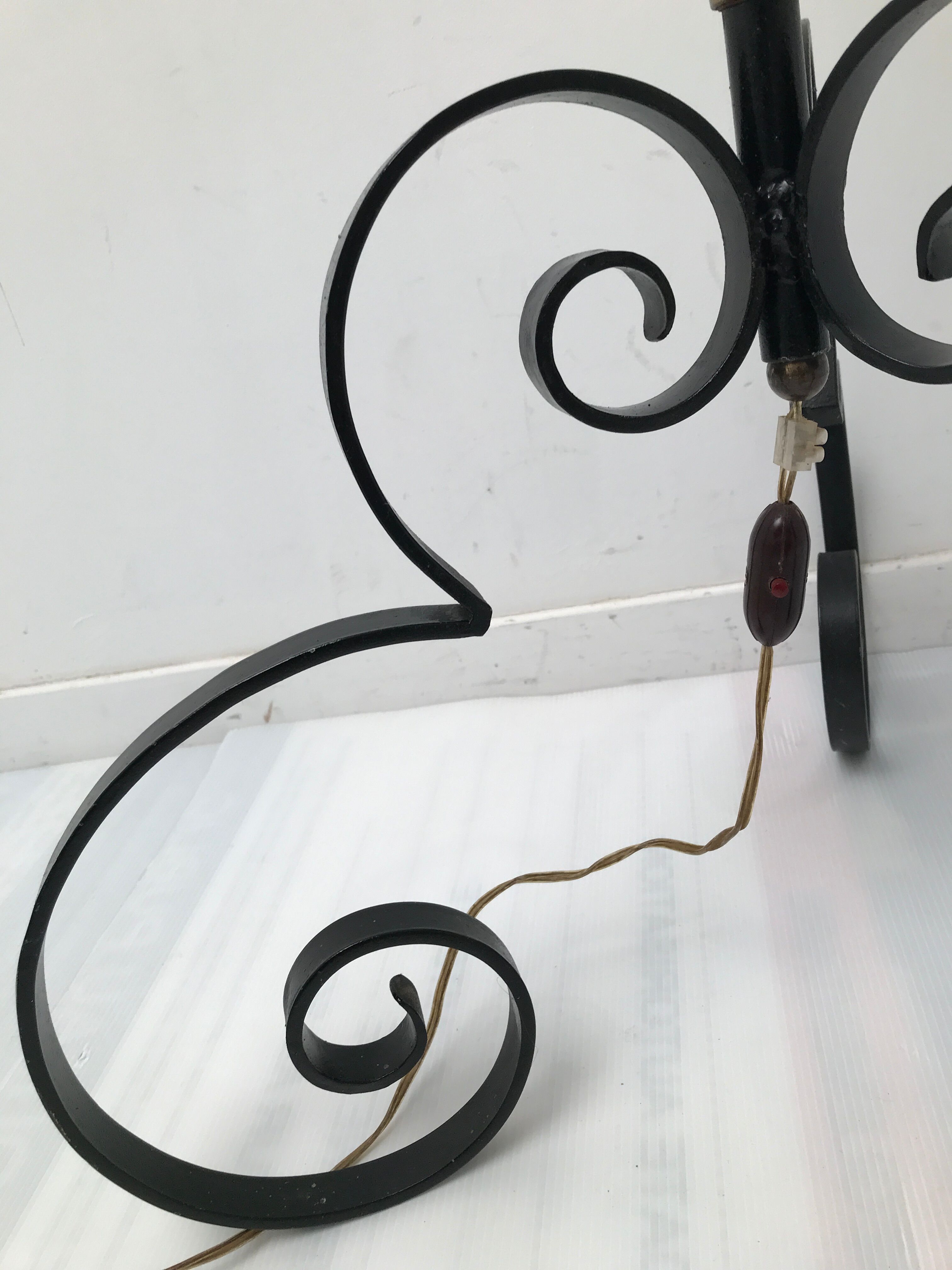 Glass lamp foot and wrought iron
