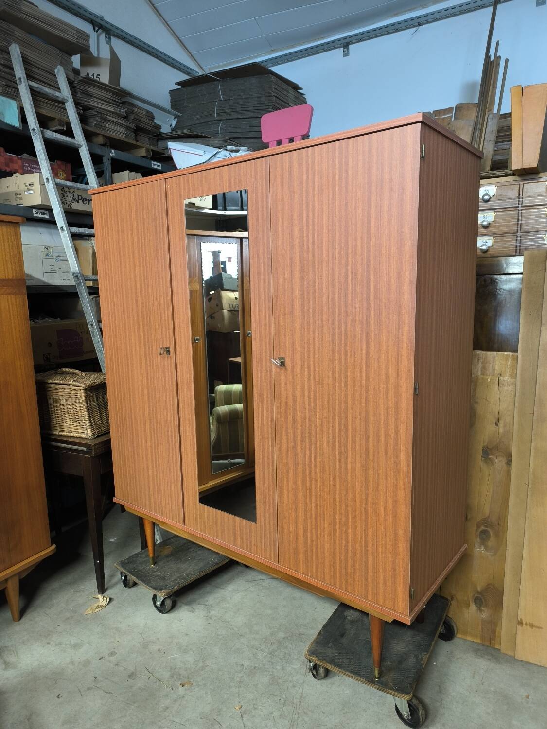 Vintage wardrobe with needle feet and 2 mirrored doors