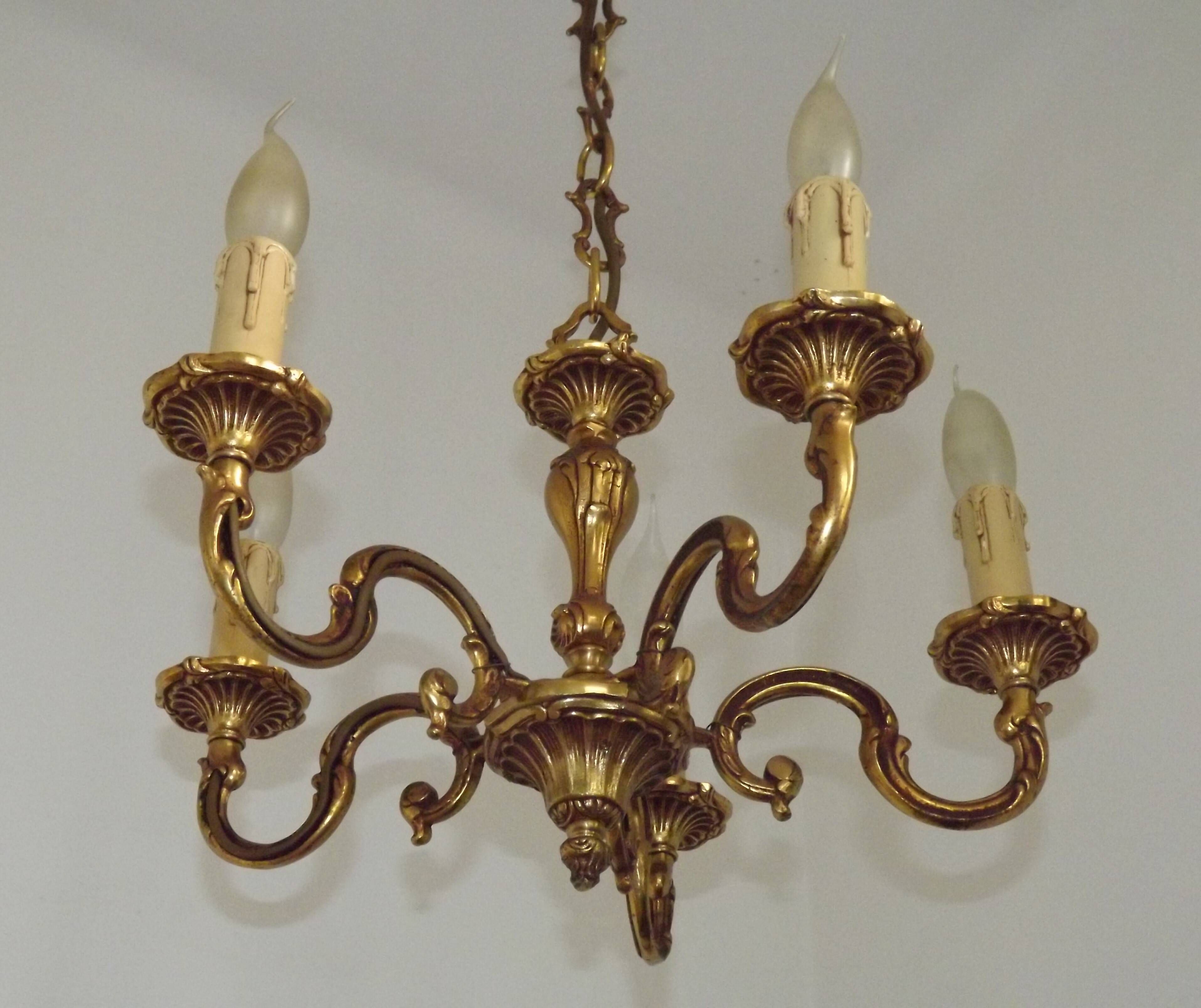 Vintage French traditional style bronze chandelier with 5 lights featuring acanthus leaf details.