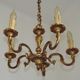 Vintage French traditional style bronze chandelier with 5 lights featuring acanthus leaf details.