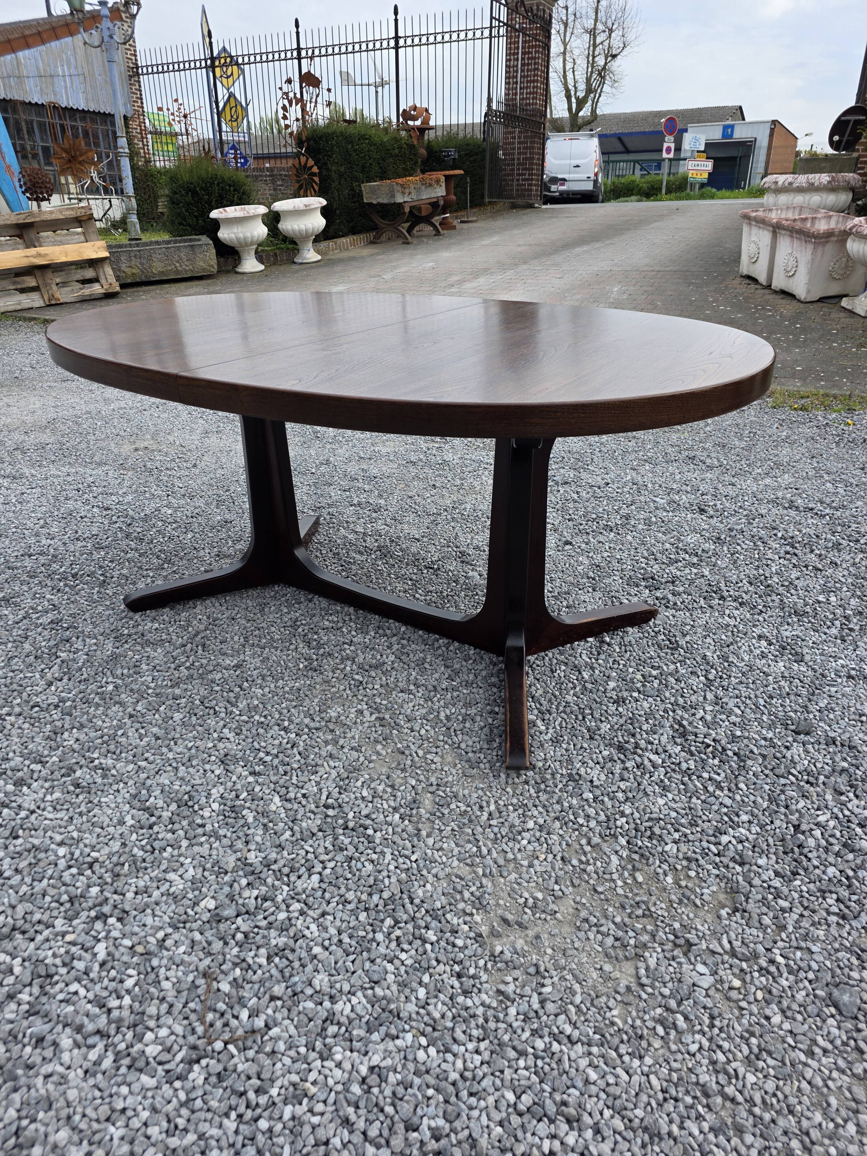 Extensible Baumann table in oak from the 1960s.