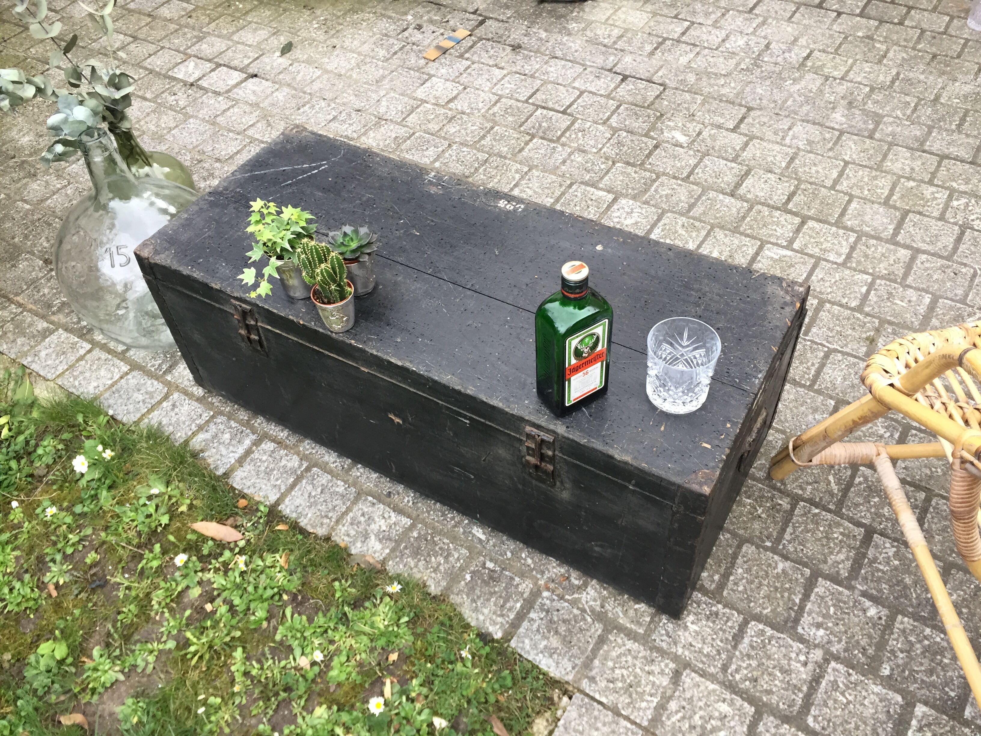 Old chest or wooden trunk black patina