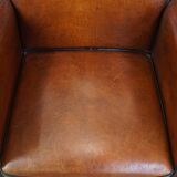 Vintage set of 4 sheepskin leather dining chairs on castors