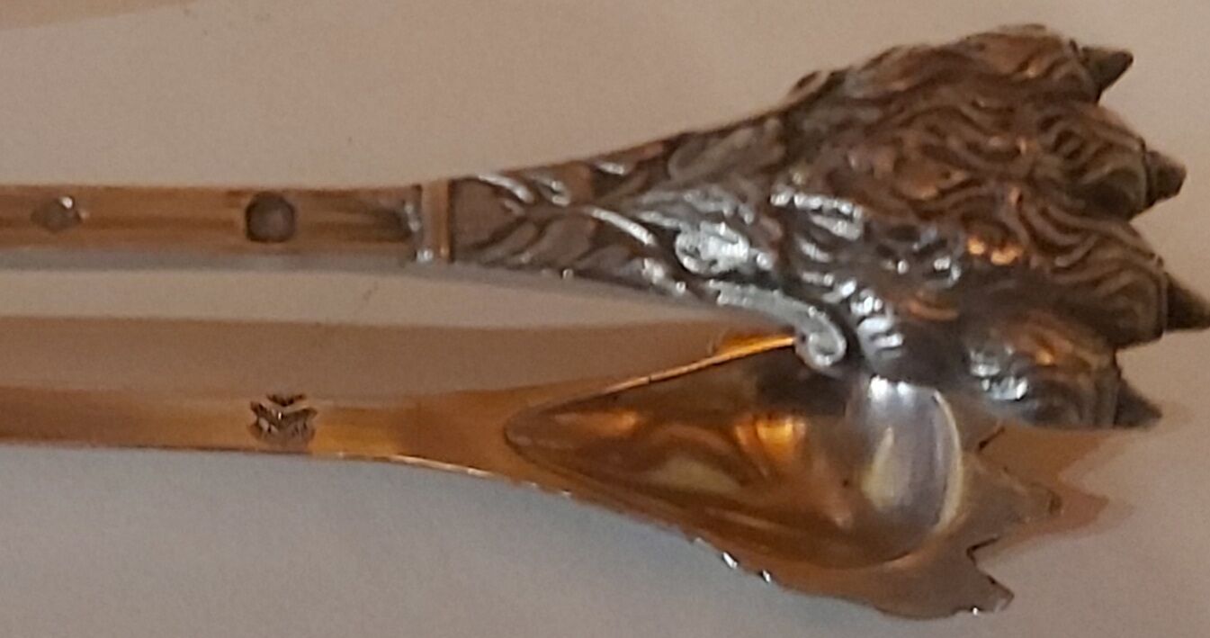 Solid silver sugar pliers neck brace