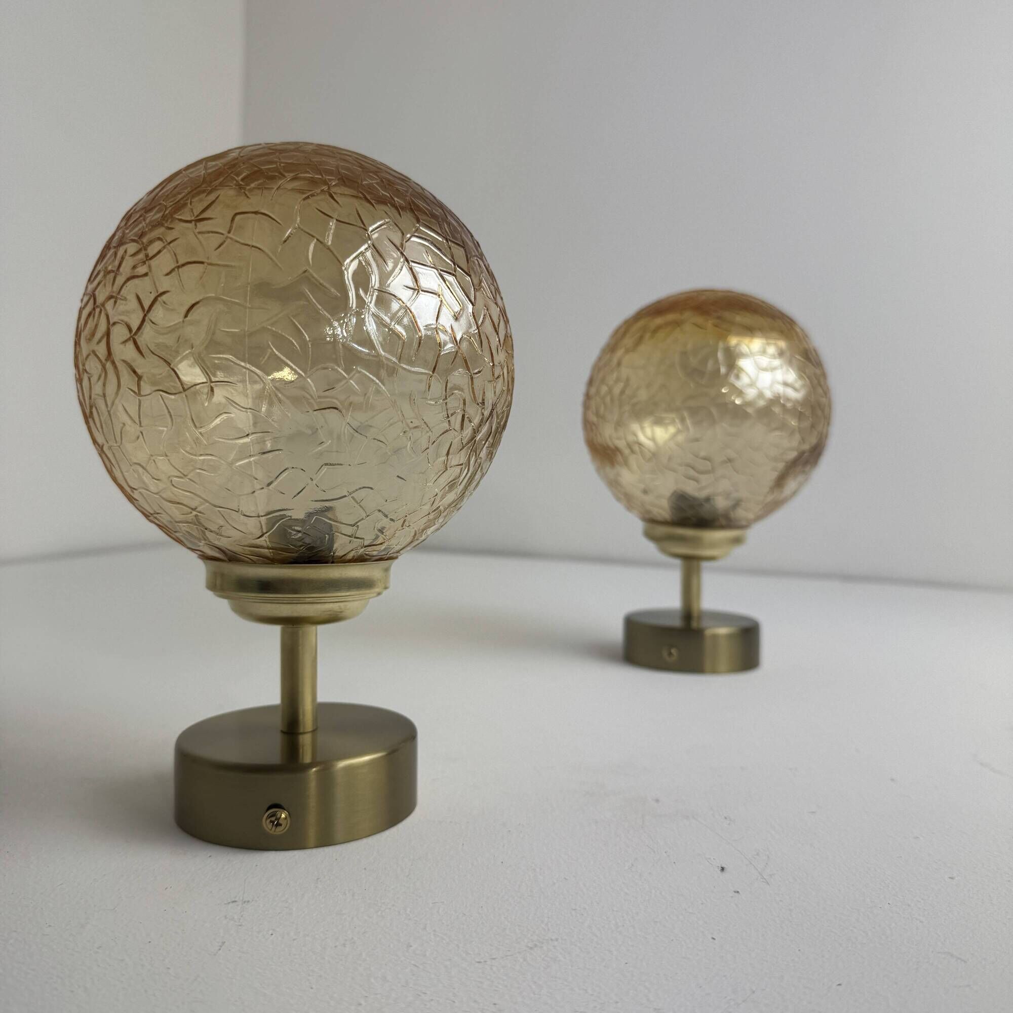 PAIR OF VINTAGE AMBER GLASS WALL LIGHTS
