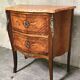 Louis XV style commode in rosewood marquetry, 20th century.
