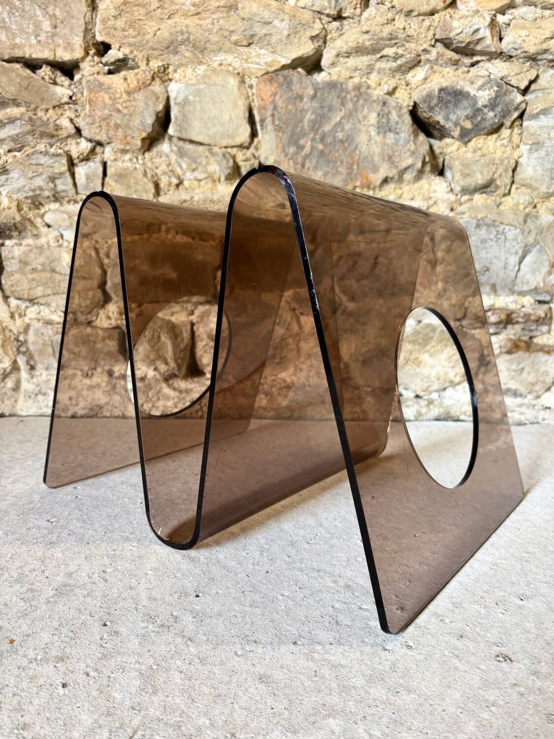 Smoked Plexiglas magazine rack by Michel Dumas for Roche Bobois 1970
