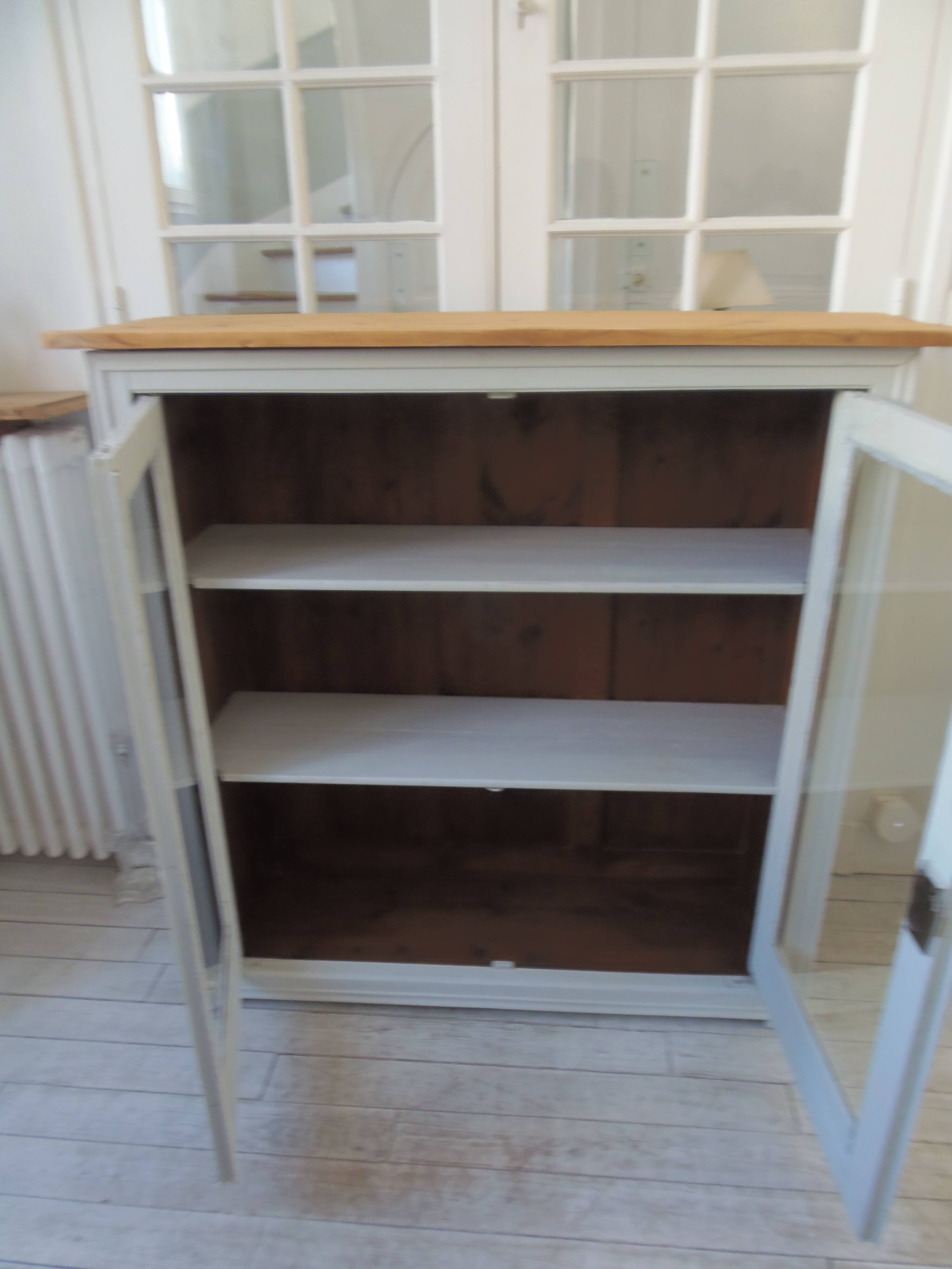 Display case, old shallow sideboard re-enchanted in cloud gray.