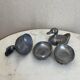 Pair of vintage decorative metal boxes in silver, shaped like ducks.