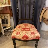 Fireplace or changing chair period 1900 in black lacquered wood and printed fabric