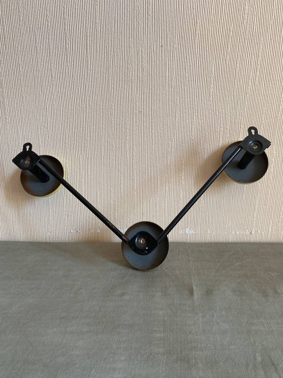 2 black and yellow metal wall coat racks