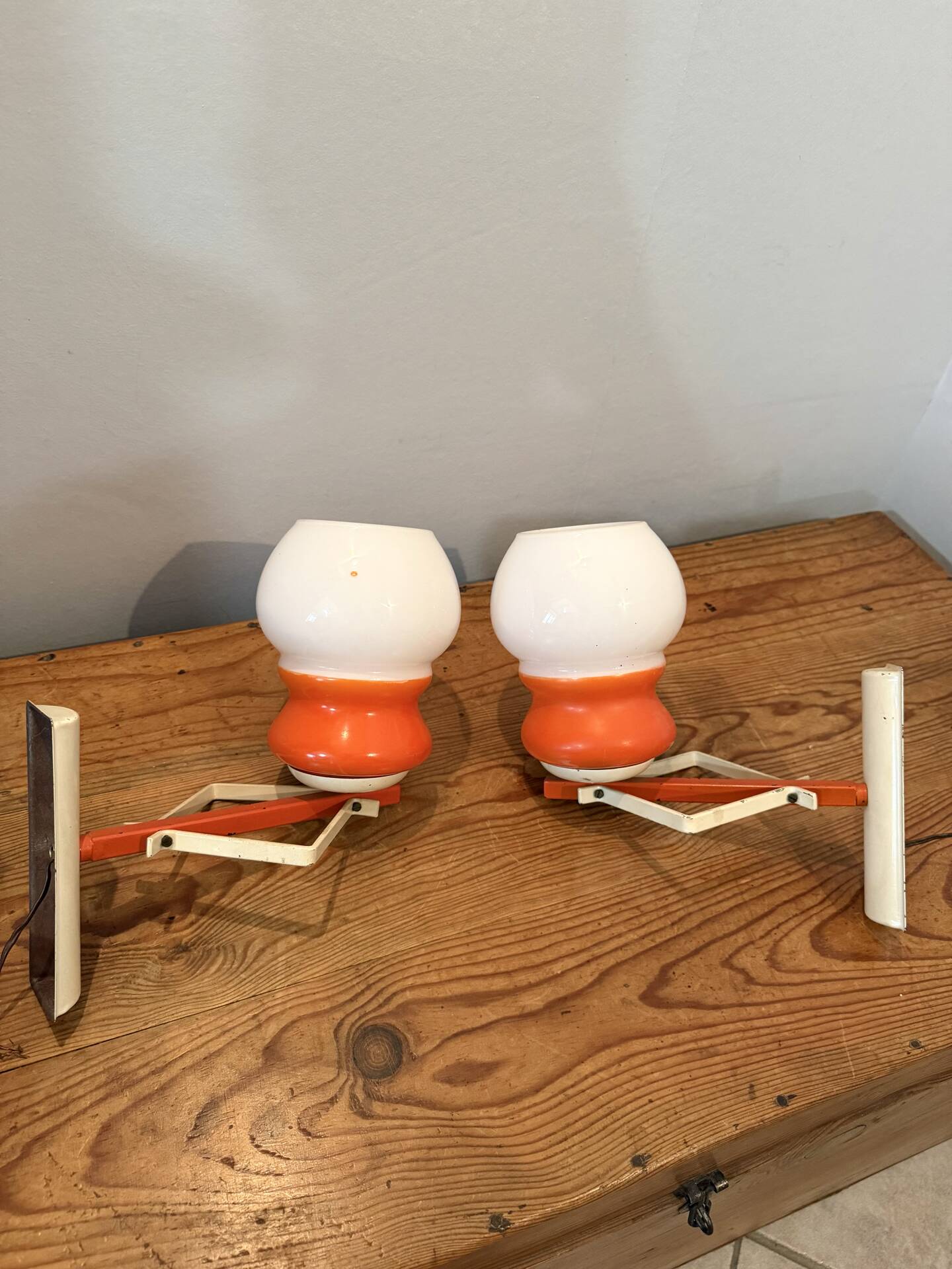 Pair of Space Age design wall lights in metal and vintage opaline.
