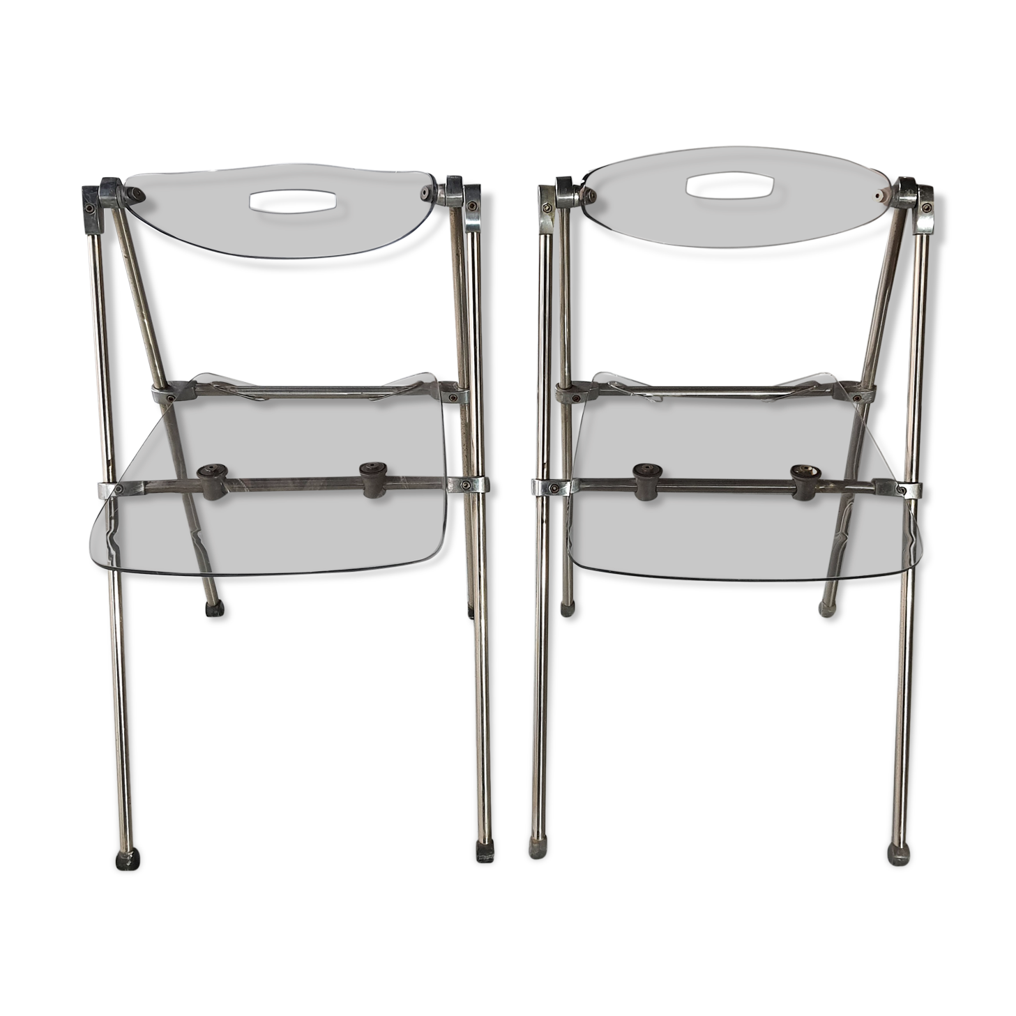Pair of modern folding chairs in plexiglass