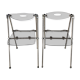 Pair of modern folding chairs in plexiglass