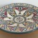 Ceramic dish decorated with yellow and purple decoration