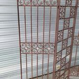 Screen partition wall made of glass and wrought iron