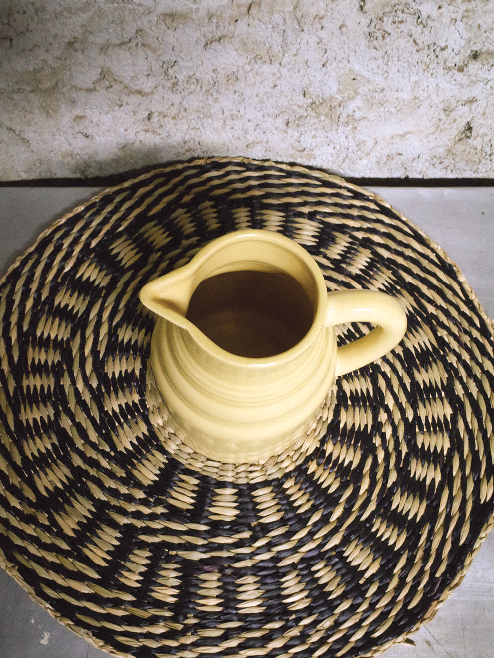 Pastel yellow ceramic pitcher