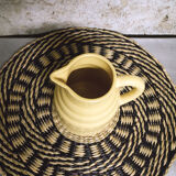 Pastel yellow ceramic pitcher