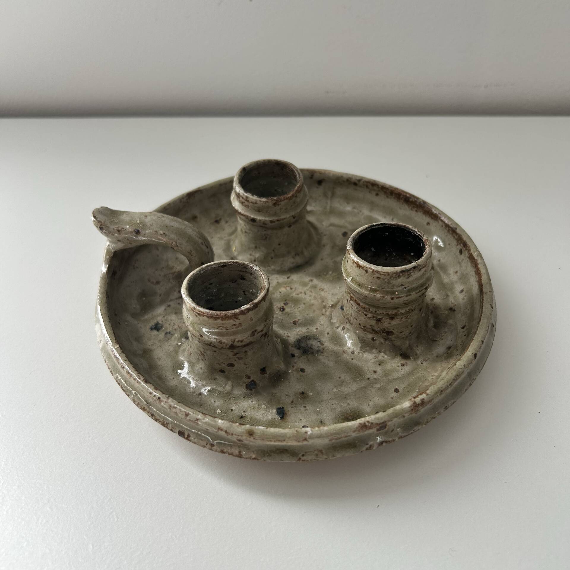 Unusual candlestick with 3 candle holders