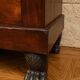 Empire Restoration period chest of drawers in mahogany, with a marble top.