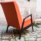 Fauteuil orange et noir scandinave restauré