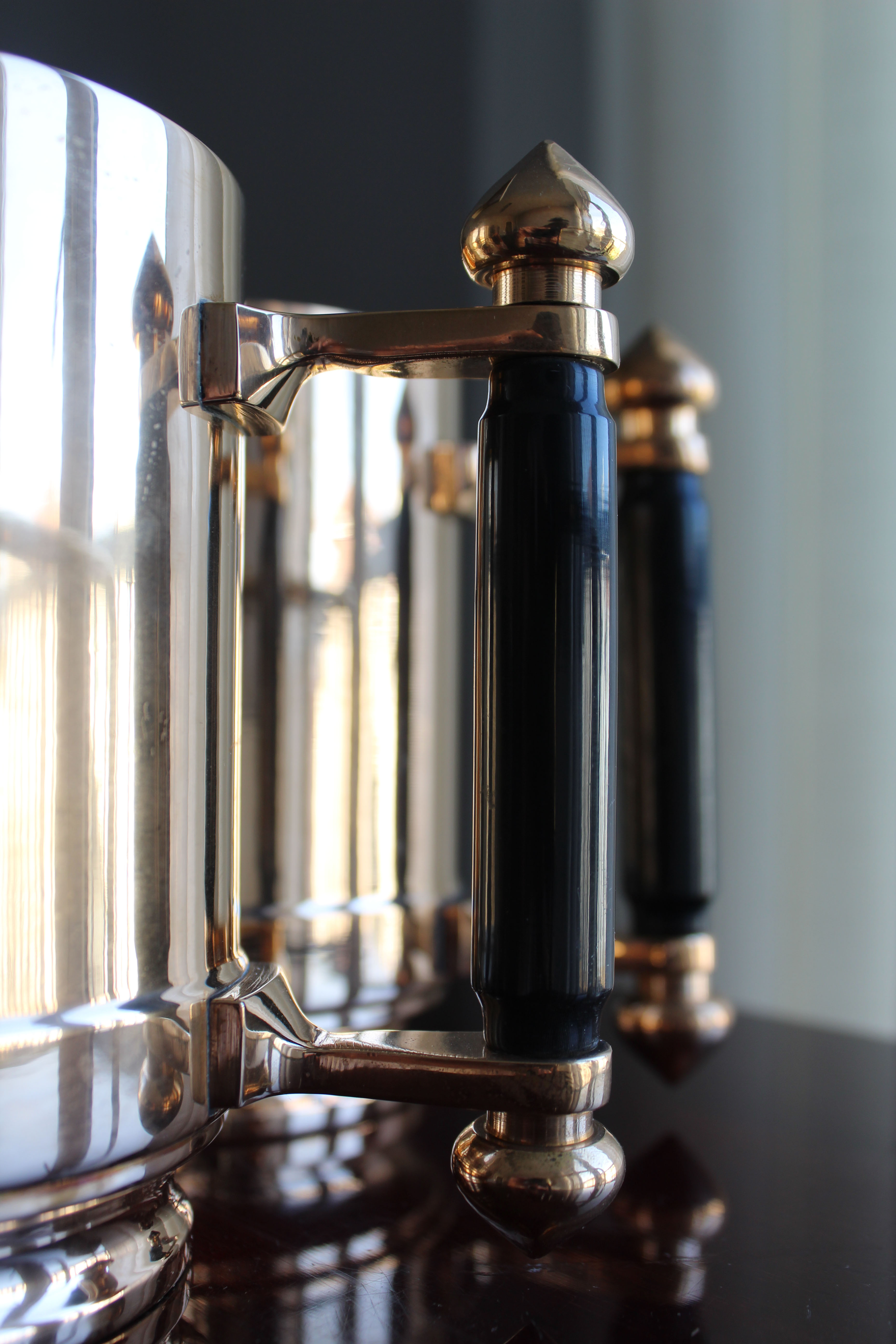 Pair of art deco bronze beer mugs France, 1940s, signed Bronze Star